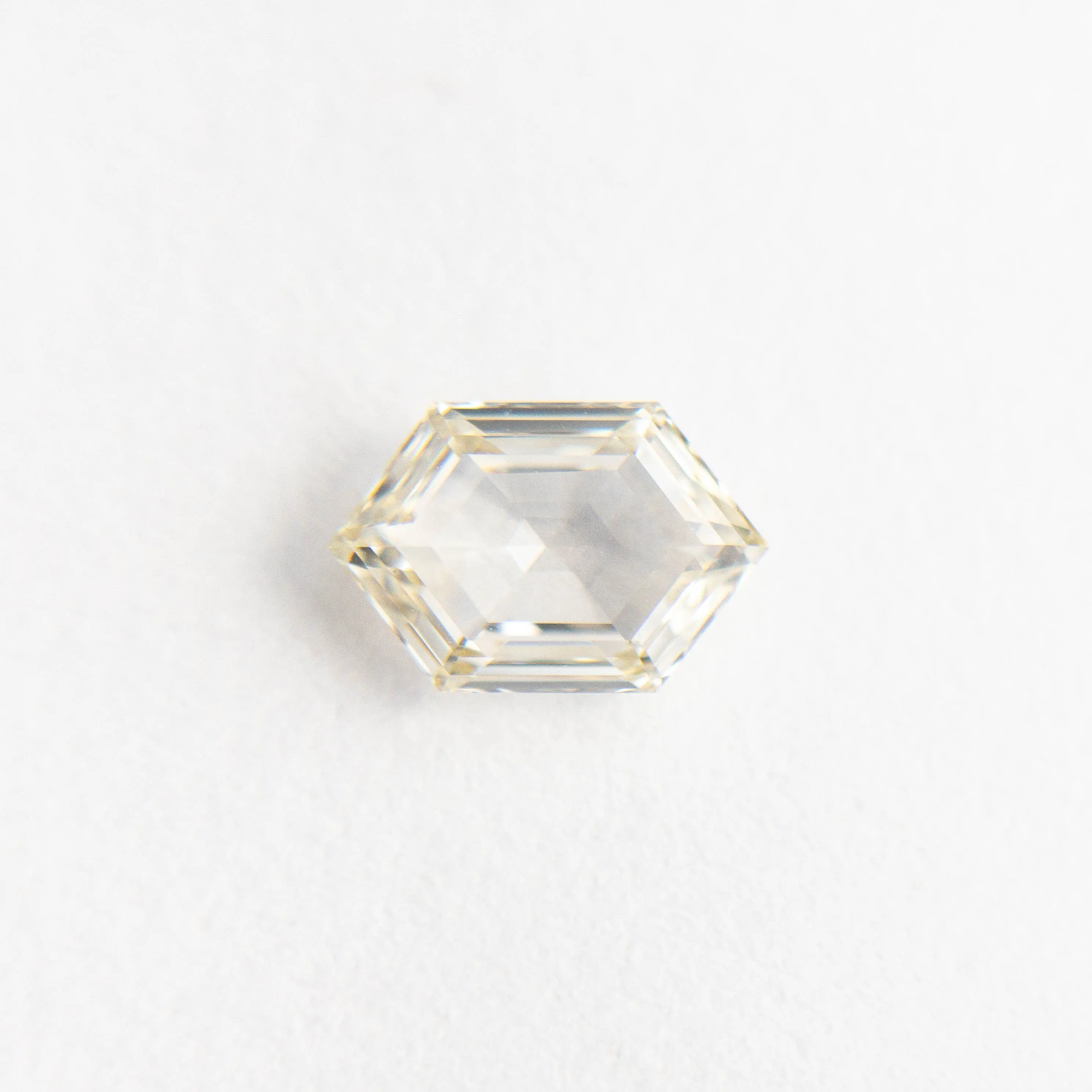 0.69ct 7.36x4.88x2.27mm VS2 L Hexagon Step Cut  19386-36