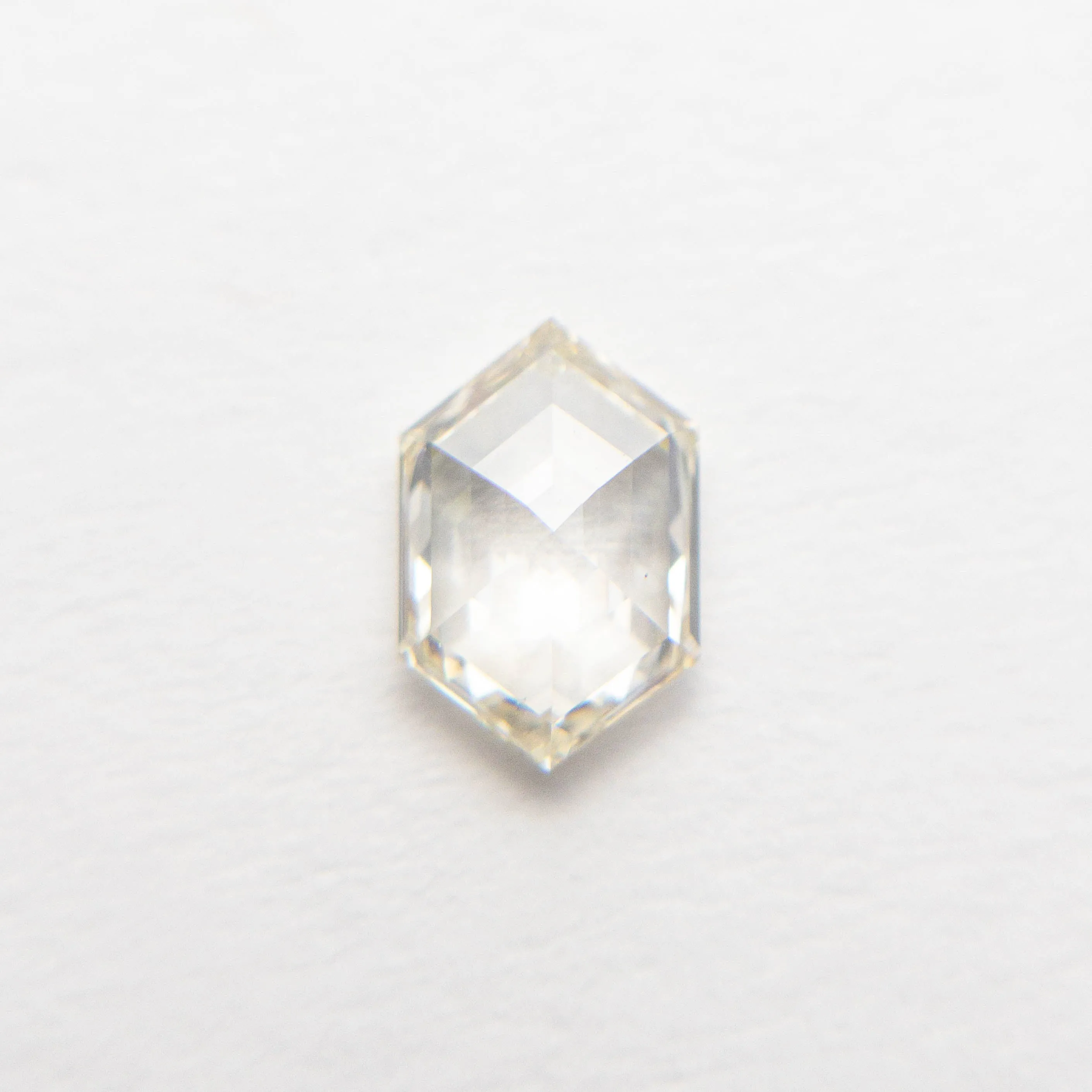 0.69ct 7.36x4.88x2.27mm VS2 L Hexagon Step Cut  19386-36