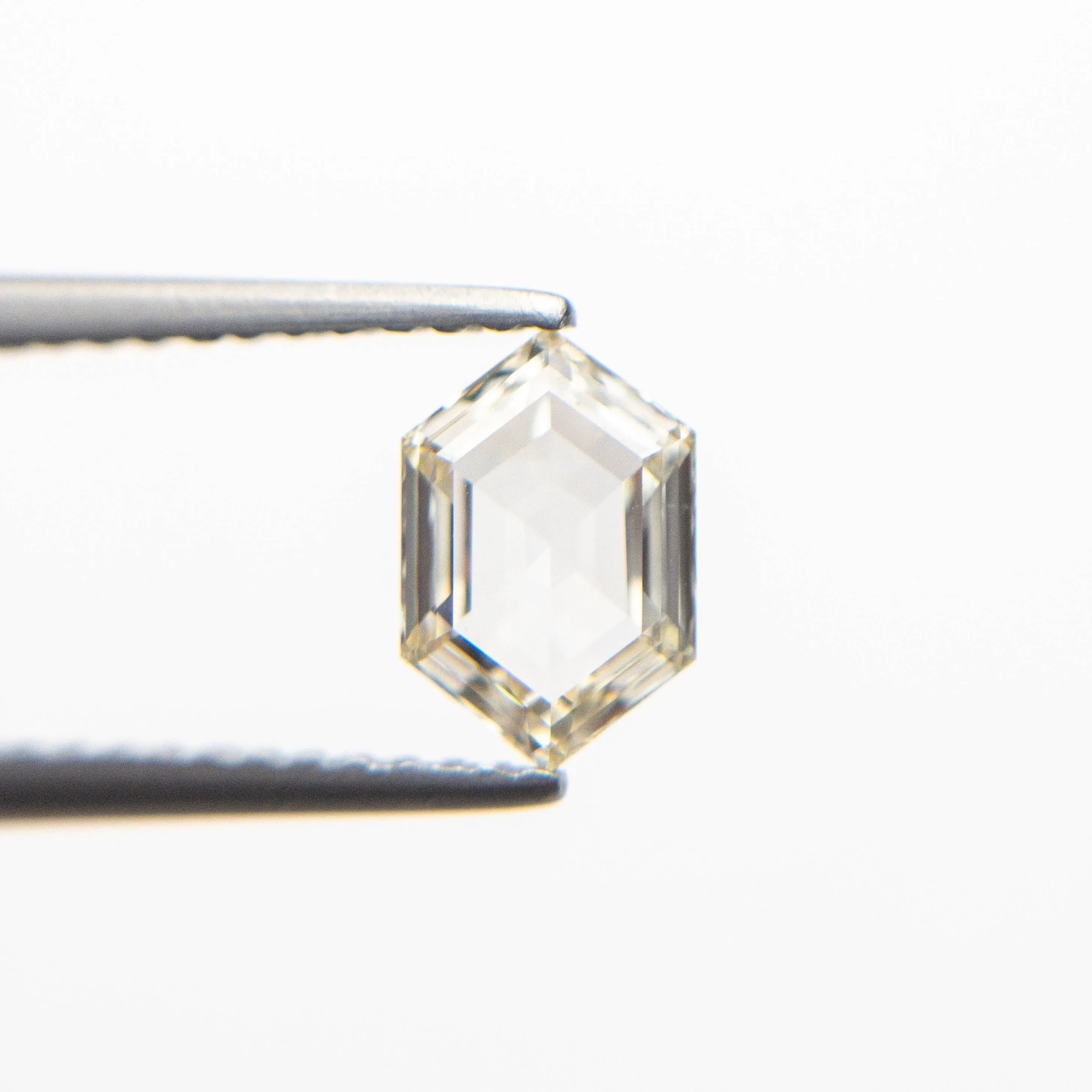 0.69ct 7.36x4.88x2.27mm VS2 L Hexagon Step Cut  19386-36