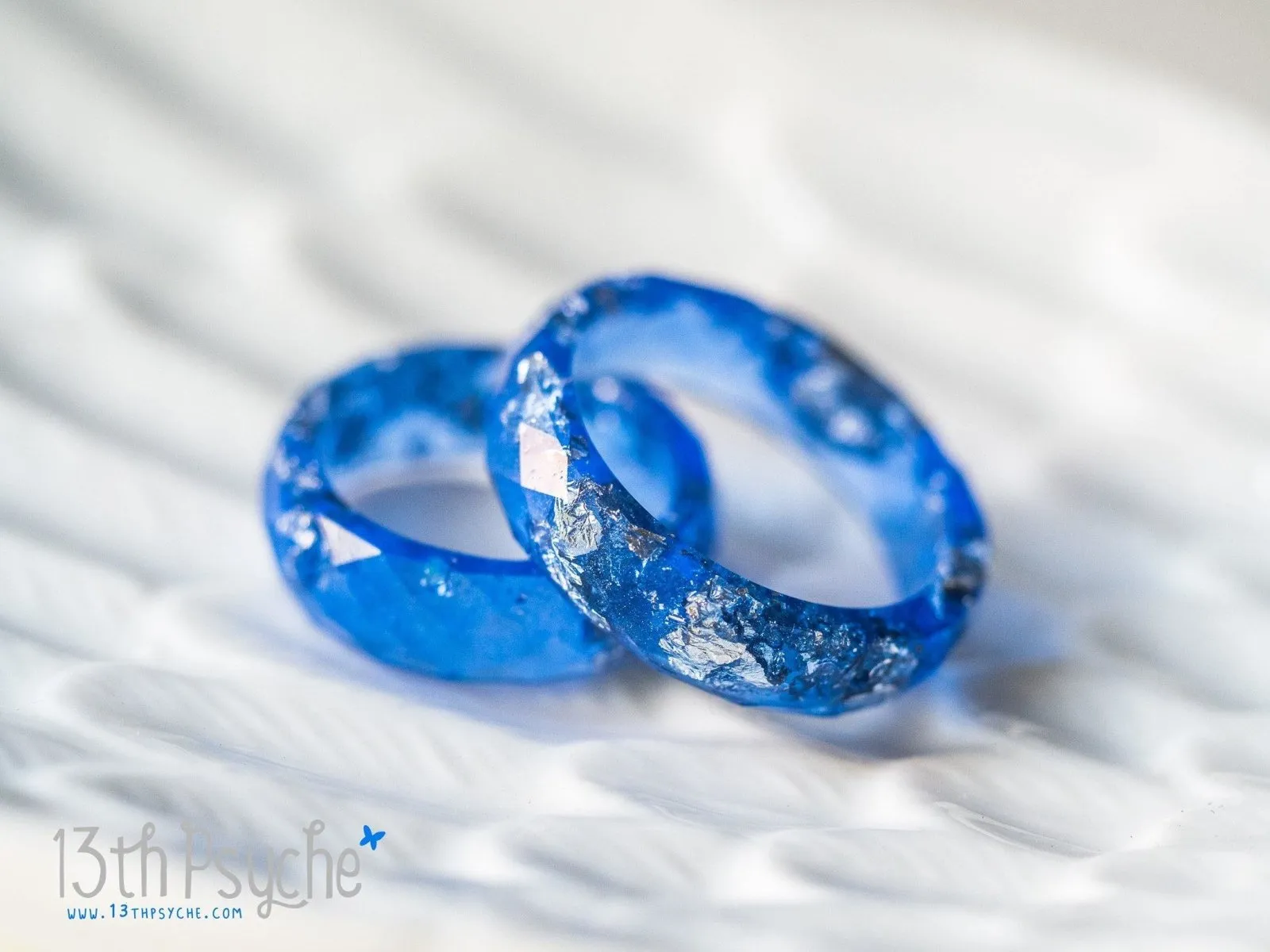 Blue and silver flakes faceted resin ring