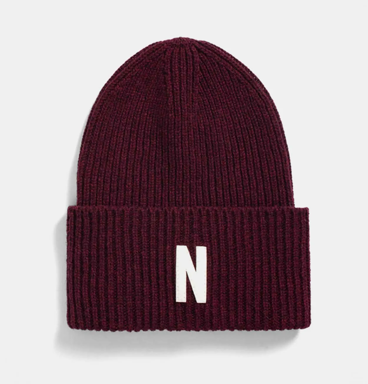 Norse Projects Merino Lambswool Rib N Logo Beanie in Burgundy