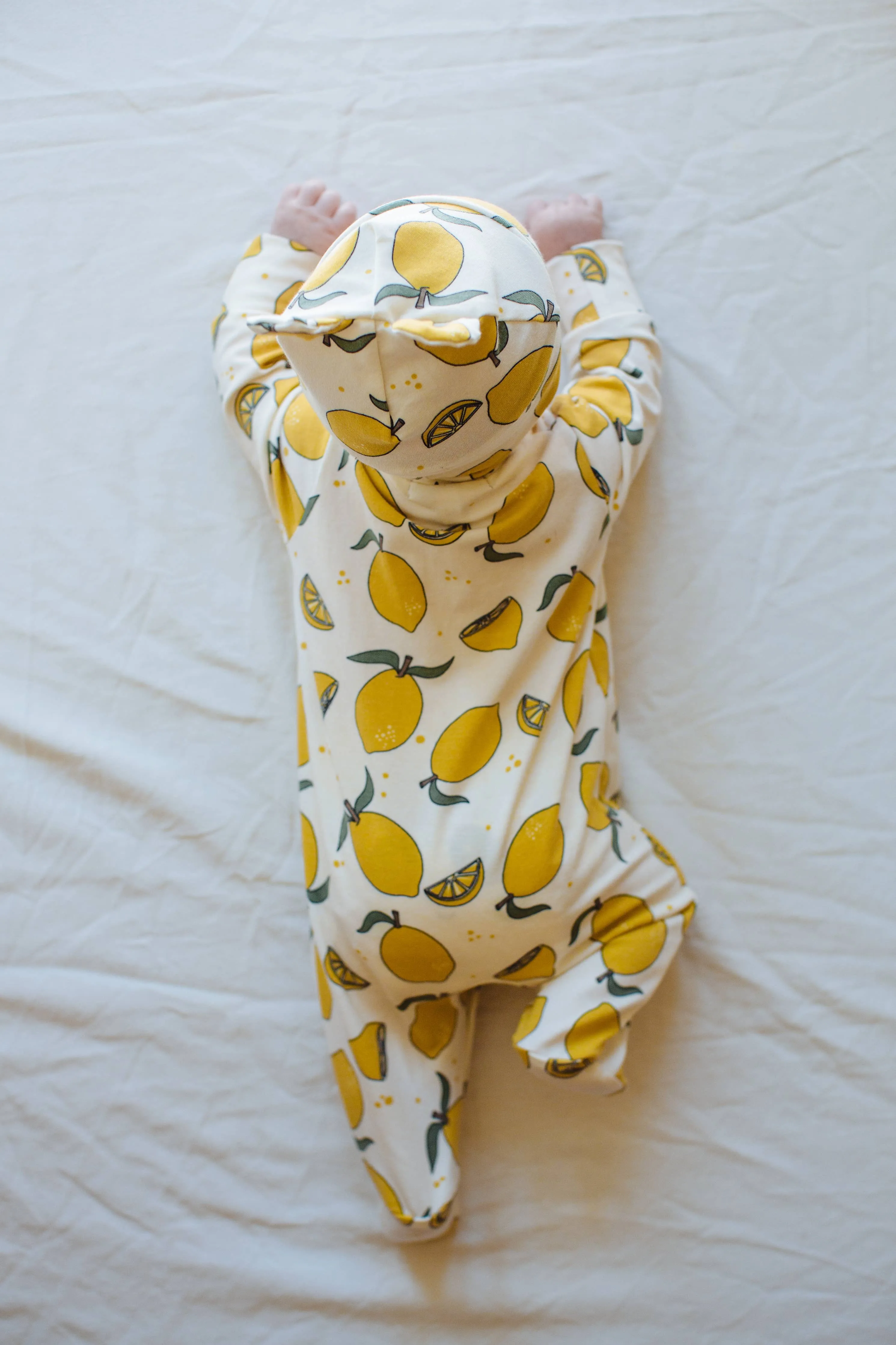 Organic cotton Baby sleepsuit  in Cream with Lemon print - Eddie & Bee