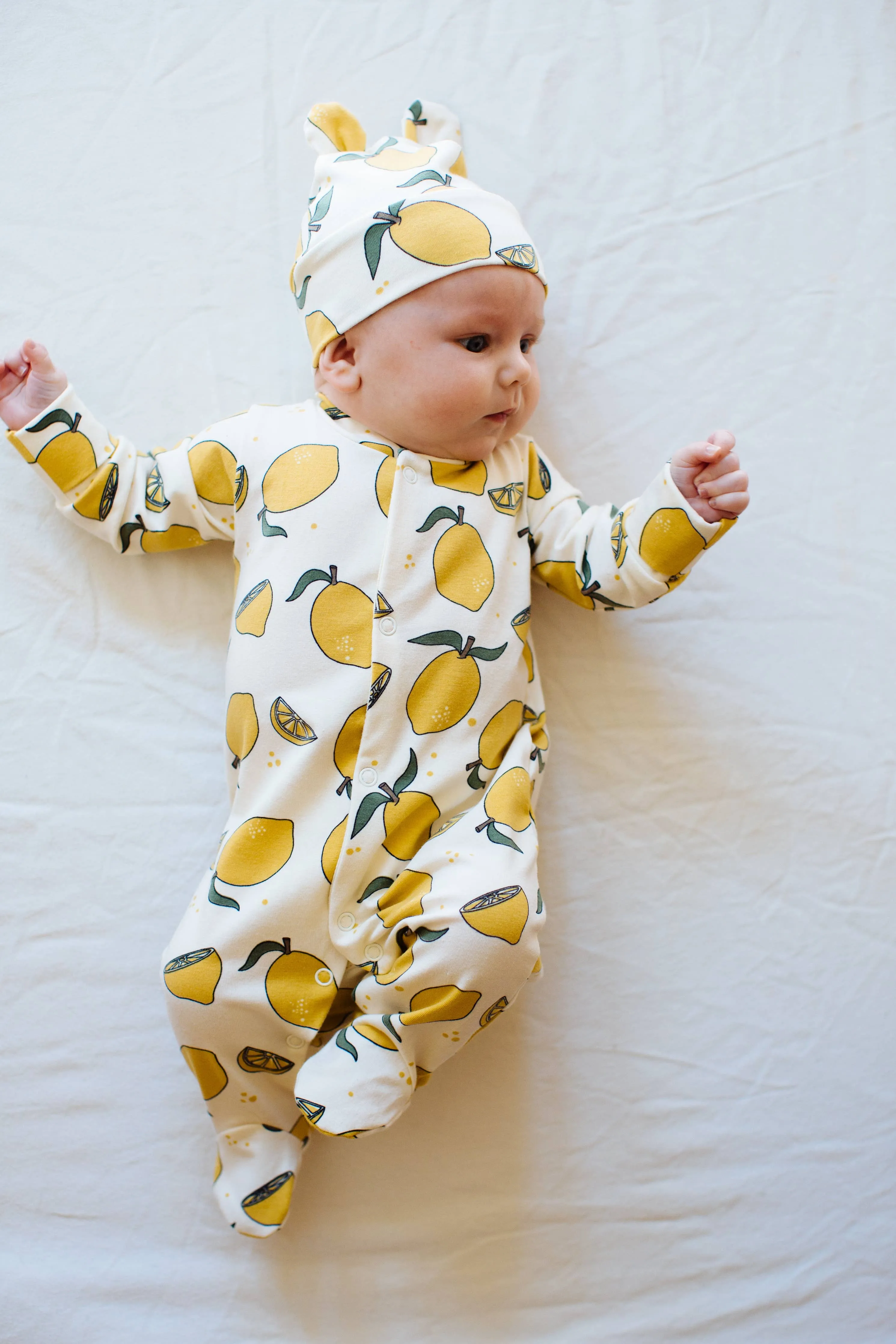 Organic cotton Baby sleepsuit  in Cream with Lemon print - Eddie & Bee