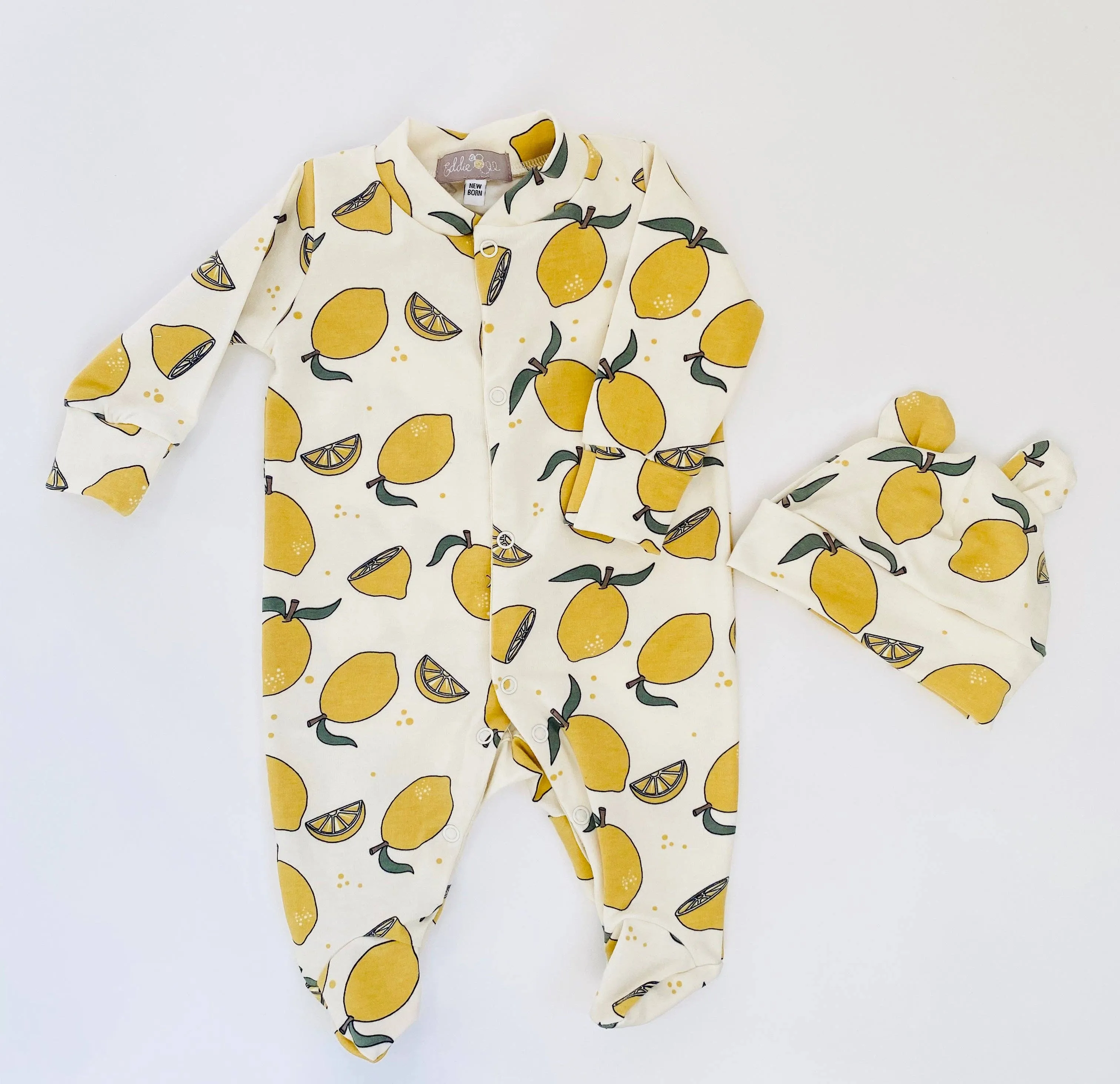 Organic cotton Baby sleepsuit  in Cream with Lemon print - Eddie & Bee